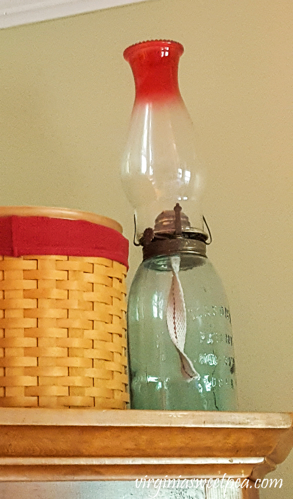 Vintage Mason jar used to make an oil lamp