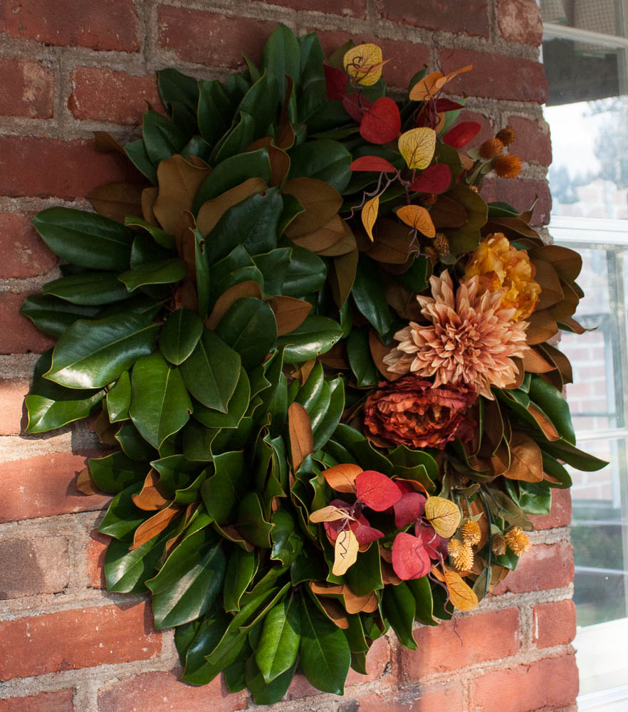 Magnolia wreath decorated with fall florals