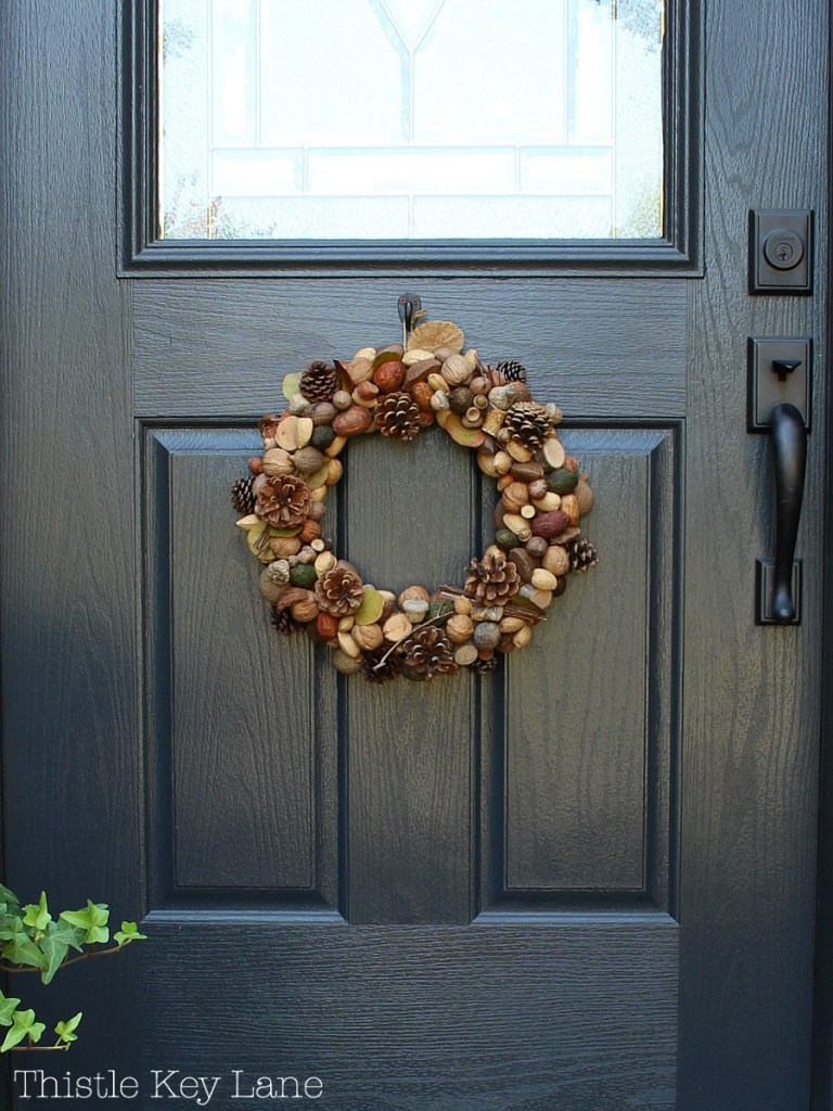 Fall wreath made with nuts and pinecones