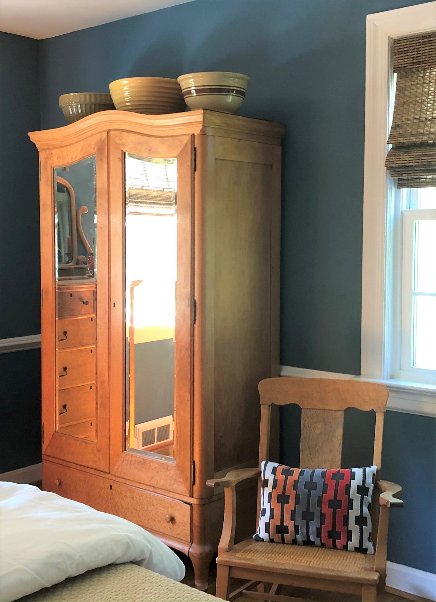 Bird's Eye Maple airmore with large pottery bowls on top.