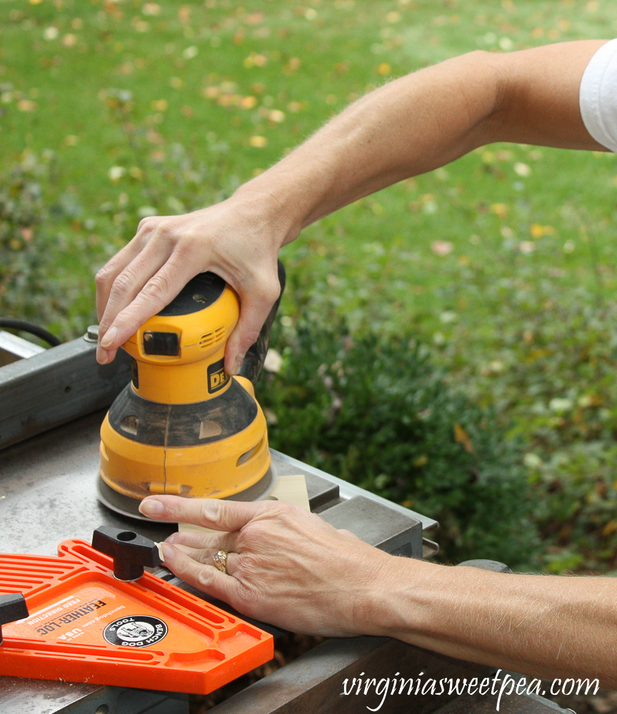 Sanding wood with an orbital sander