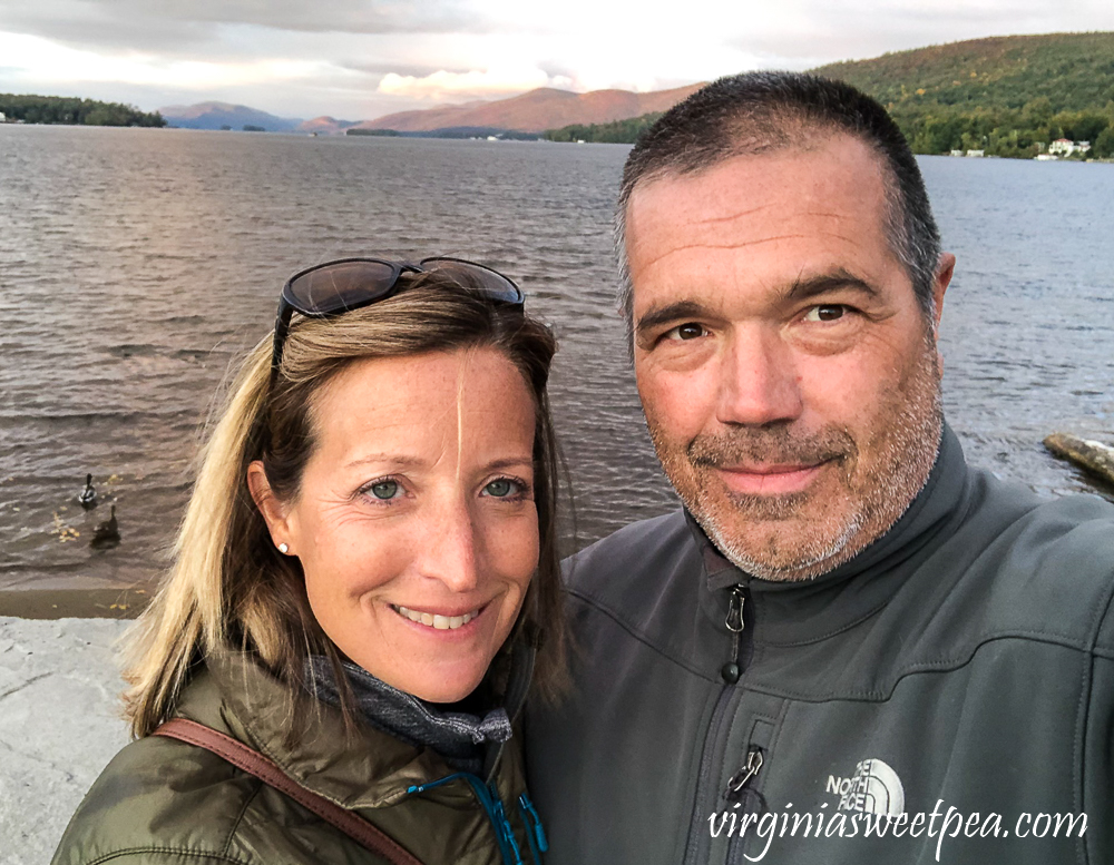 A couple enjoying Lake George, NY on a fall evening