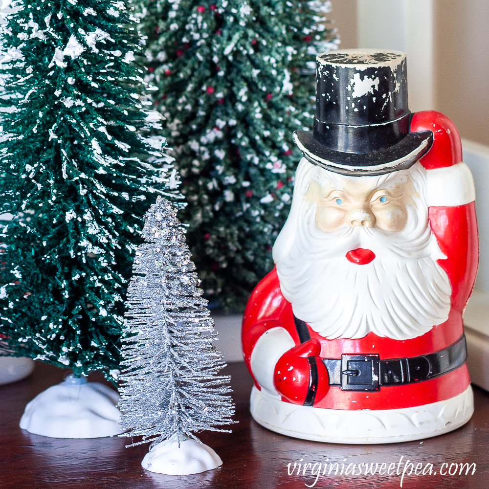 Vintage Santa bank with bottlebrush trees