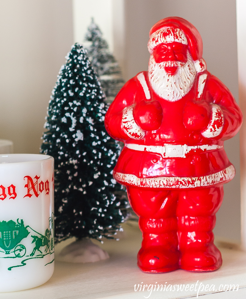 Vintage Santa candy holder with bottlebrush trees and an eggnog cup