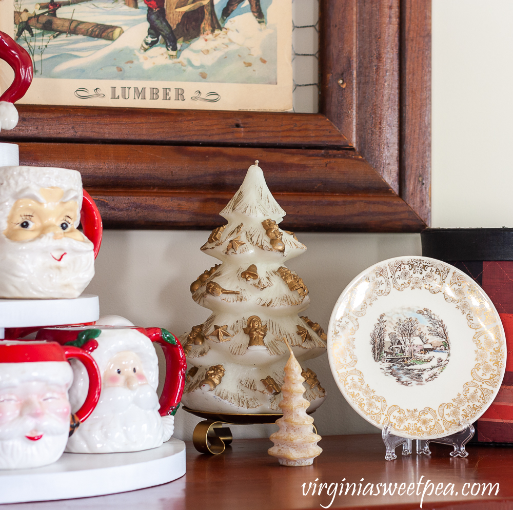 Vintage Santa mugs with vintage Christmas candles and a Knowles plate