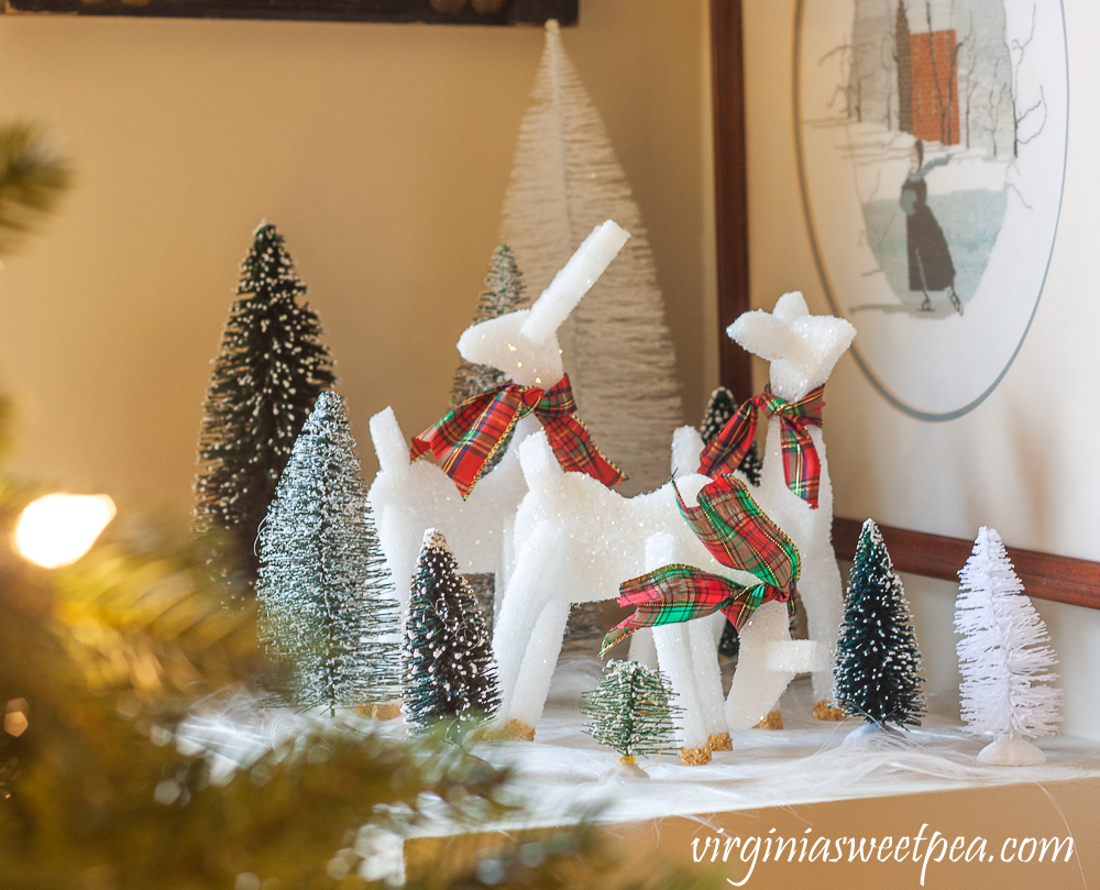 Three styrofoam reindeer with plaid bows