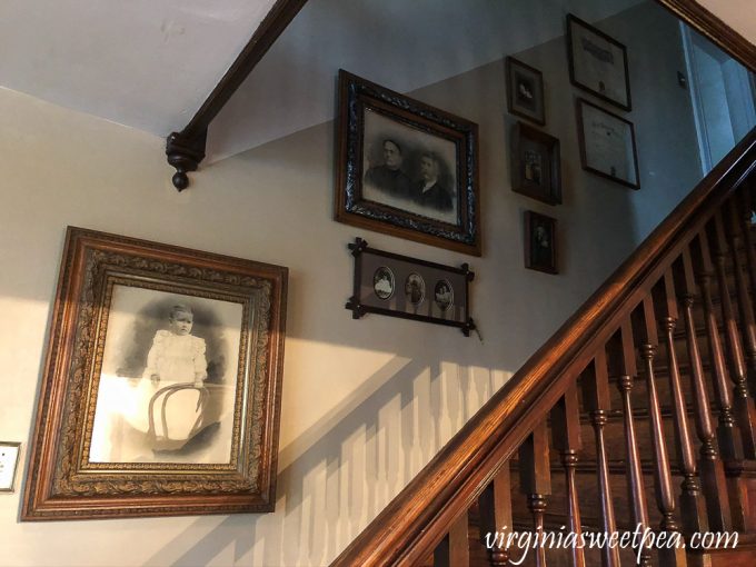 Antique Framed Family Pictures on a Stairwell
