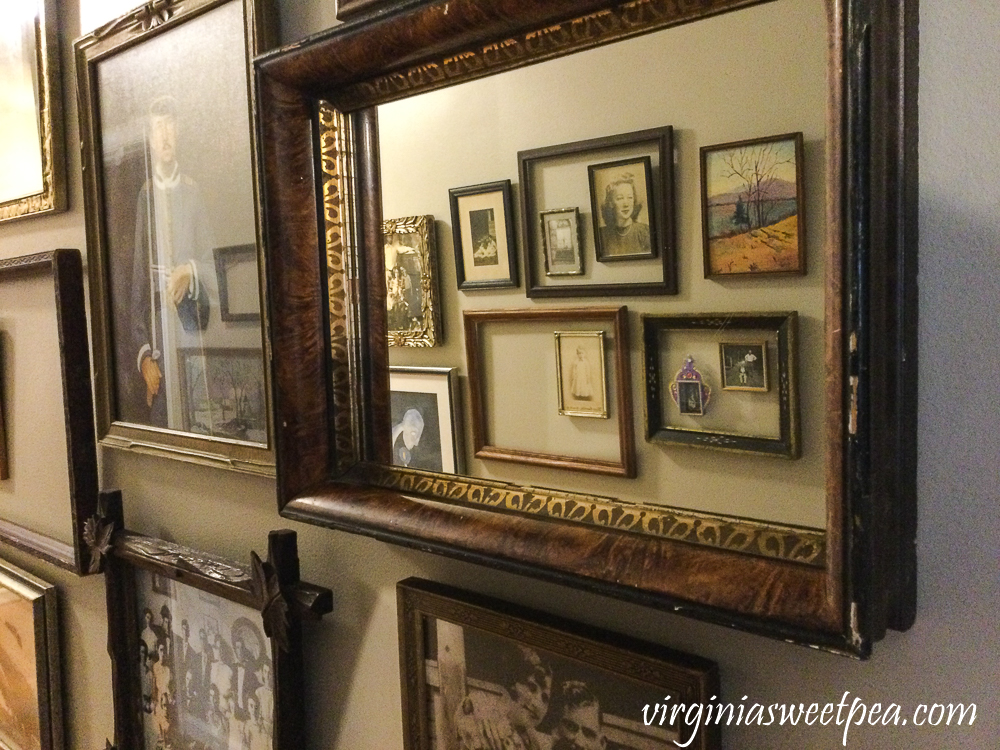 Frames lining a hallway's walls