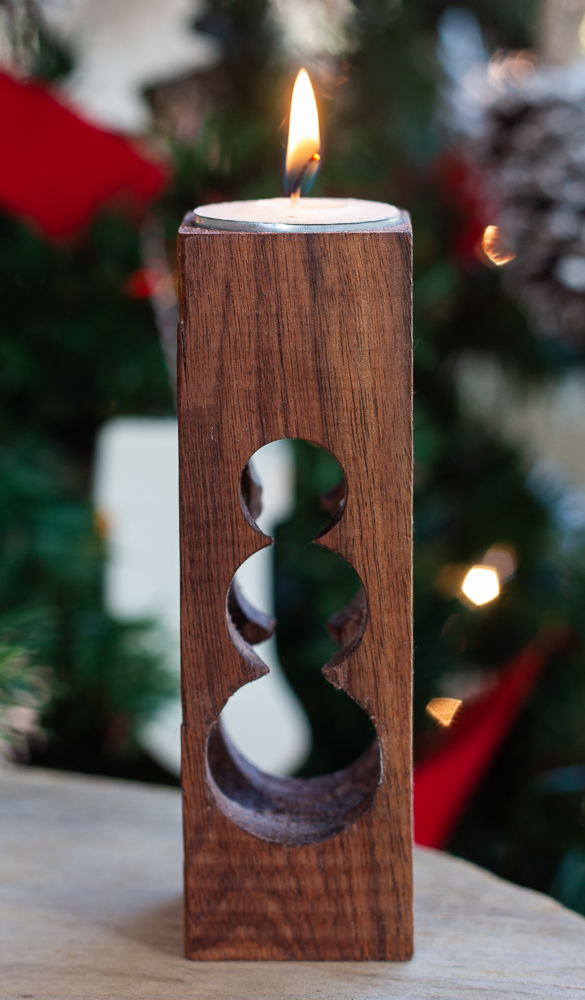 Snowman Wooden Candle Holder with a snowman cut into the wood