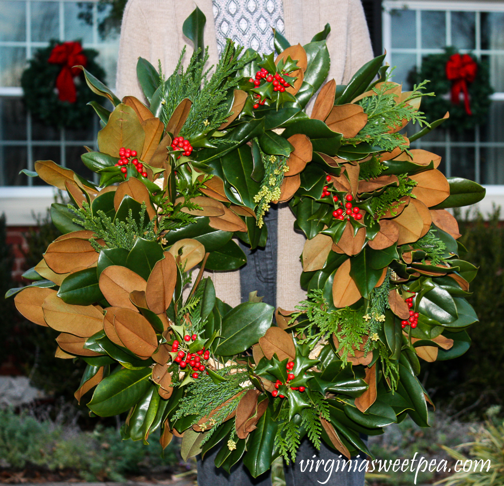 Christmas Magnolia wreath with added Holly and evergreens