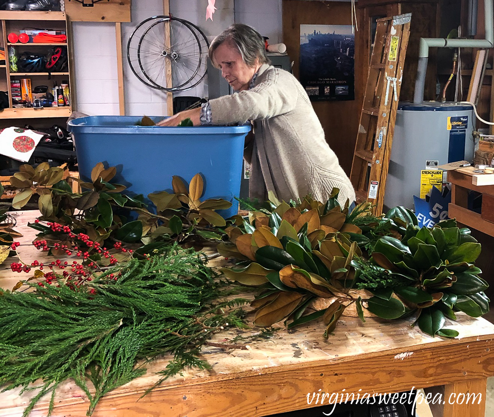 Making a Magnolia wreath in a basement