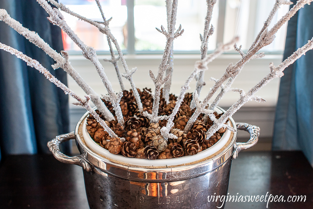 Hemlock pinecones in a vintage silver ice bucket with Epsom salt coated branches