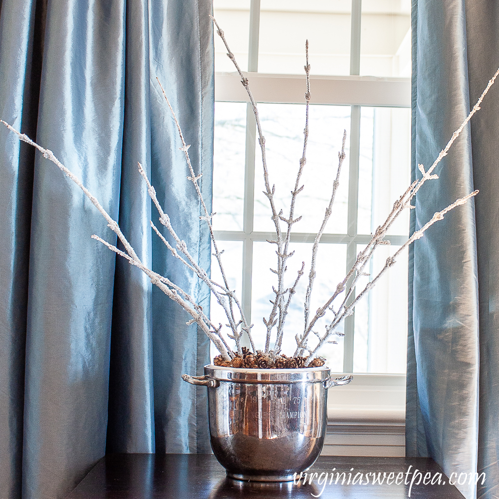 Epsom salt coated branches in a vintage silver ice bucket