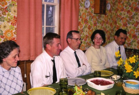 Family meal in a 1969 kitchen