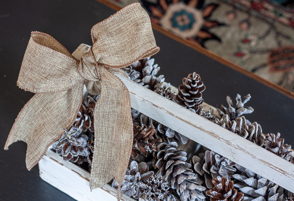 Burlap Bow tied on a vintage toolbox