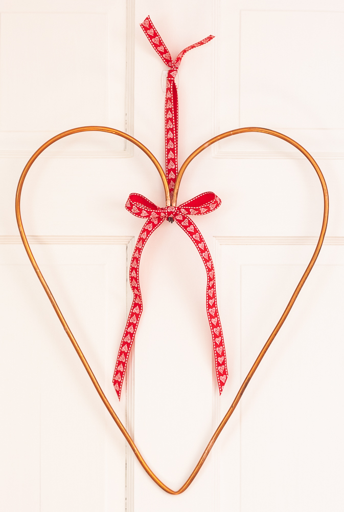 Heart shaped wreath made using an upcycled 1/4" copper refrigerator water line