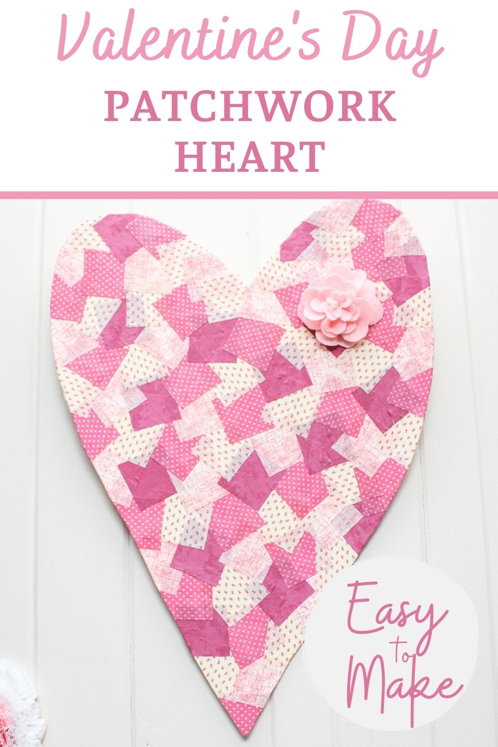 Heart cut from foam core decorated with squares of fabric for a patchwork appearance.