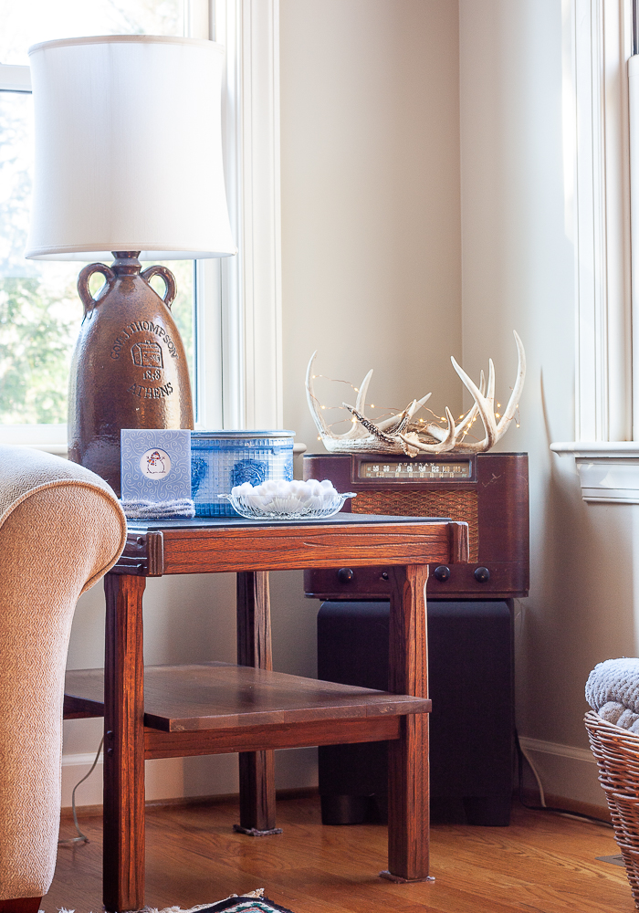 1960s end table and lamp decorated for winter