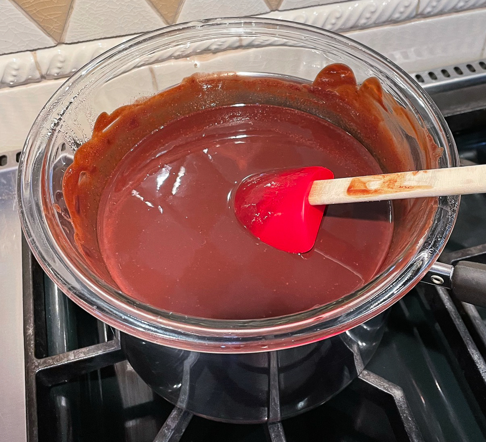 Melted chocolate and butter in a glass bowl