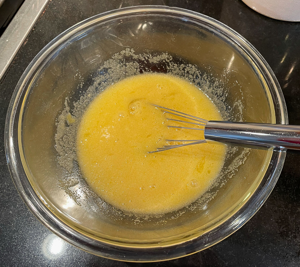 Egg, sugar, vanilla mixture for making homemade brownies