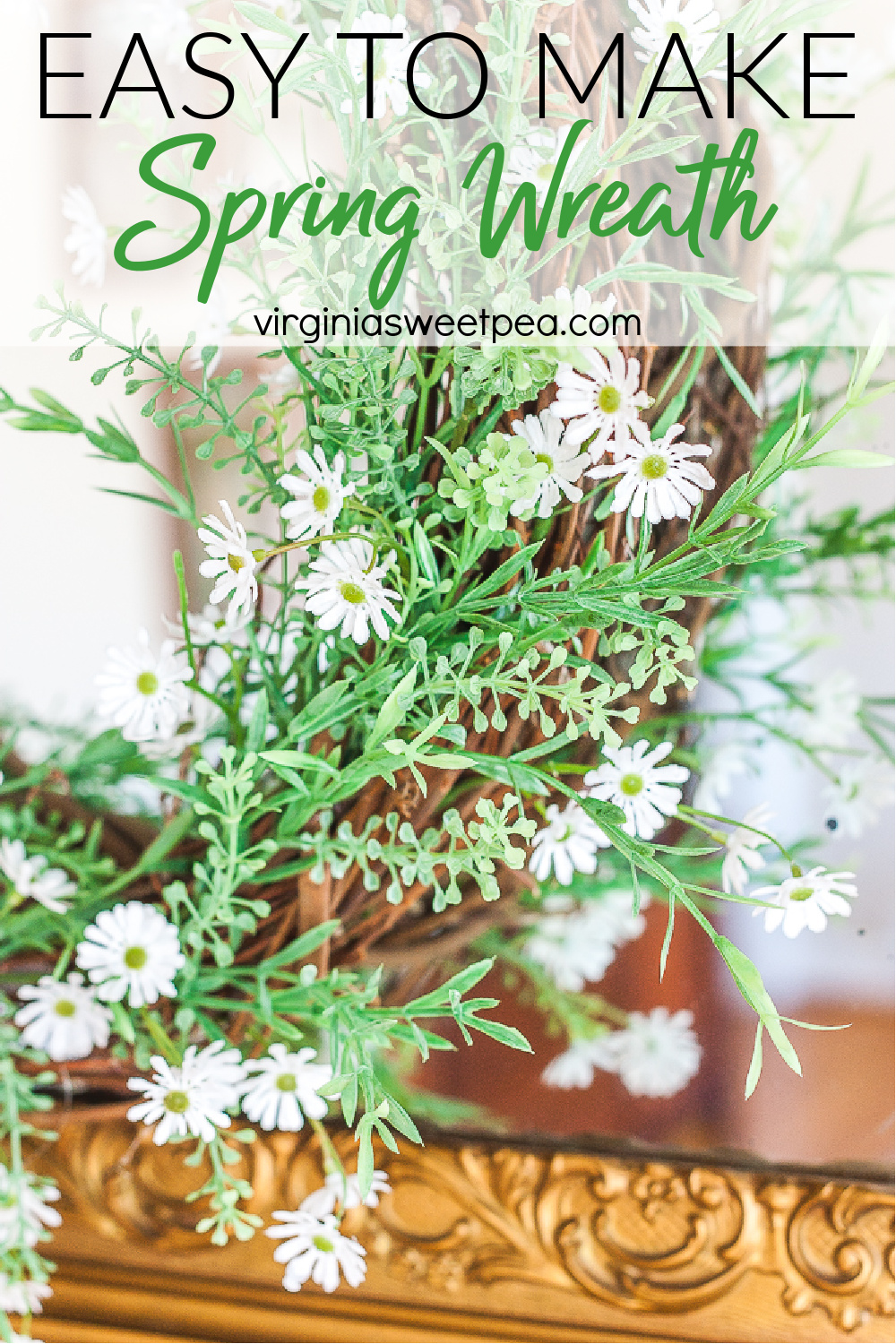 Spring wreath made with a grapevine wreath, greenery, and small daisies