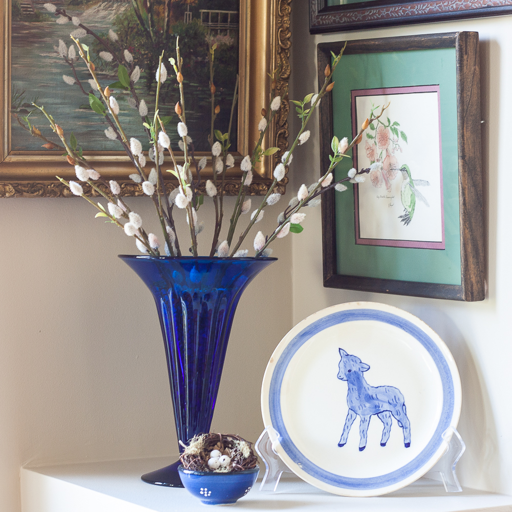 Vintage cobalt blue vase filled with pussy willow, vintage Blue Ridge Pottery lamp plate, nest in a Greek pottery bowl