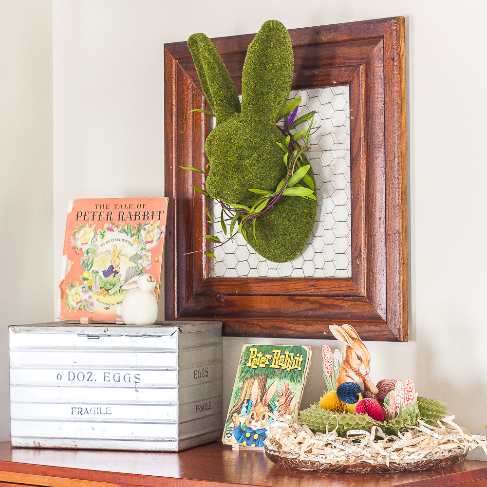 Easter Vignette with a 1942 and 1961 Peter Rabbit book, antique egg shipping crate, 1960 rabbit with honeycomb base and eggs