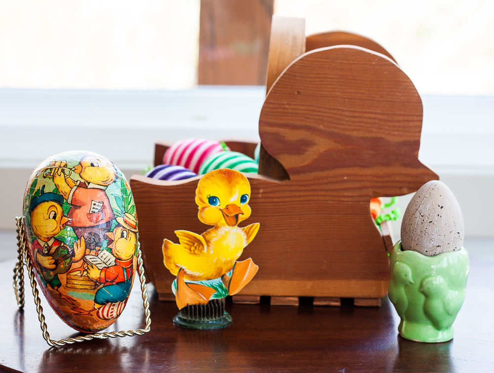 Easter vignette with wood chick basket, 1970s paper egg decorated with chicks, antique green egg cup