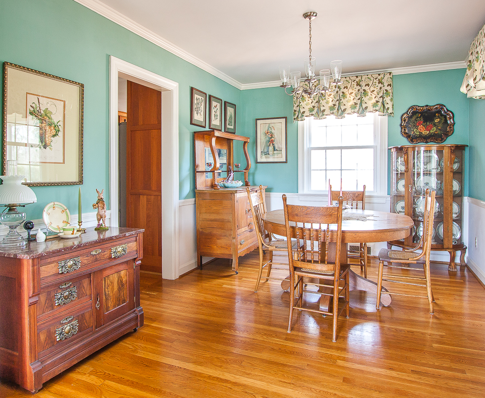 Antique filled dining room decorated for spring