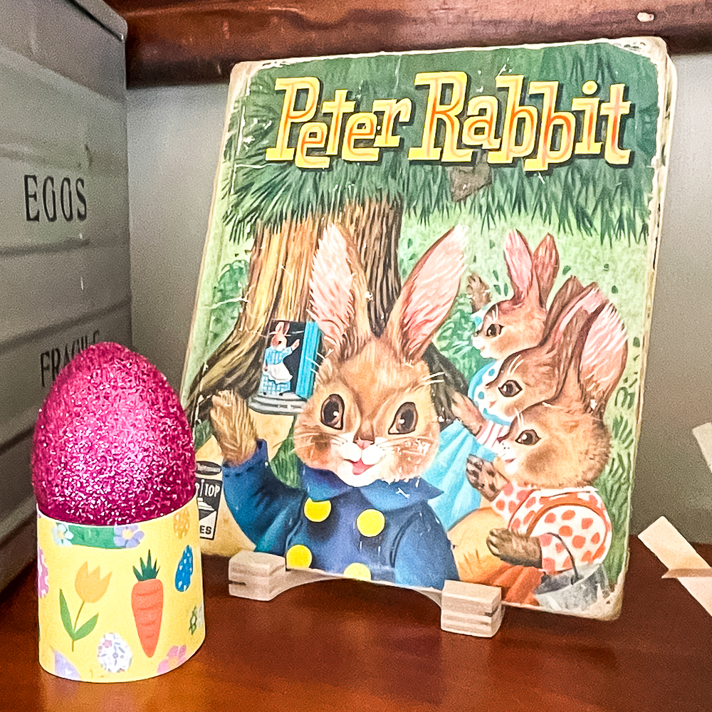 1961 Peter Rabbit book with glittered egg in a paper egg holder