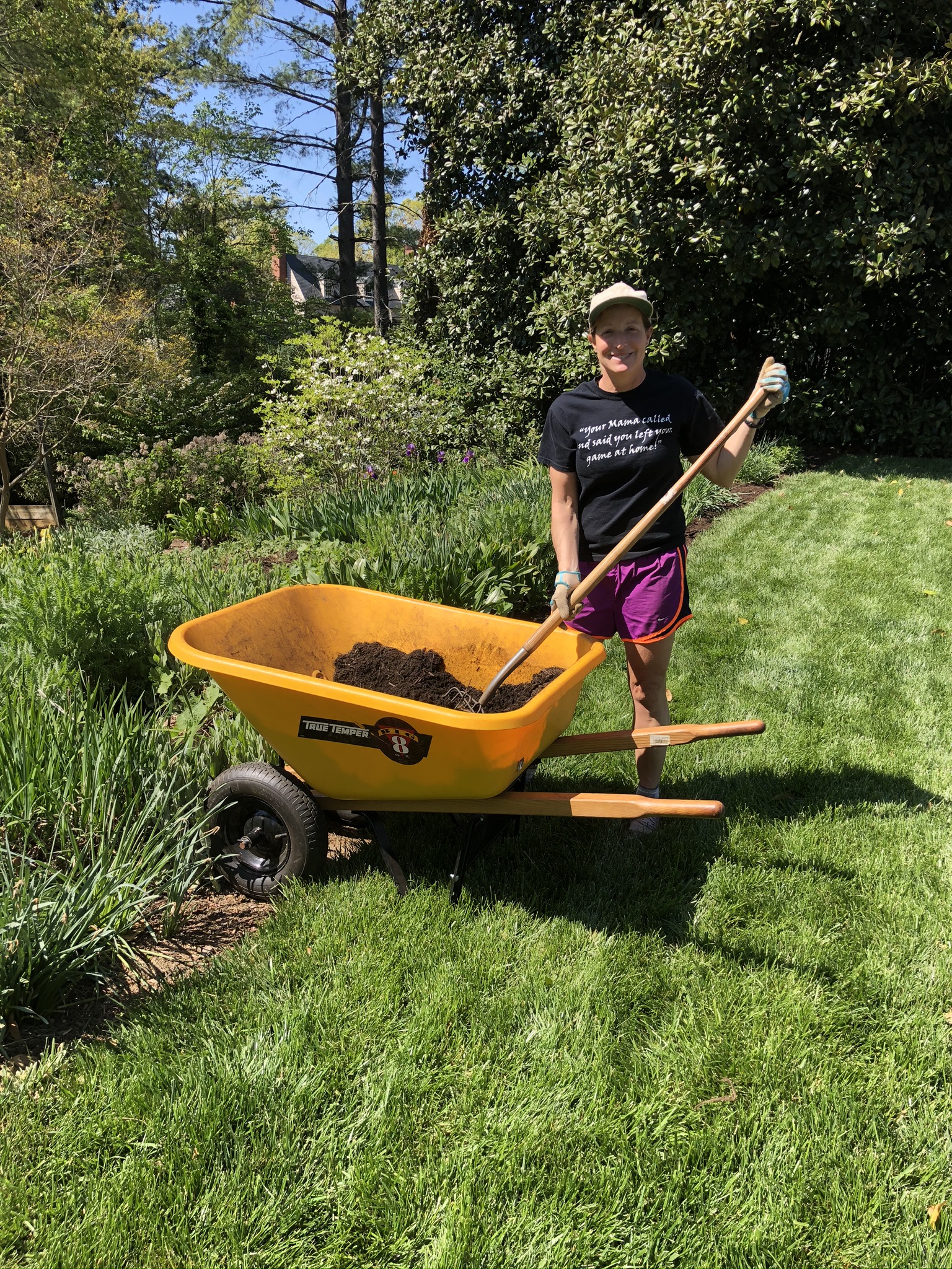 Woman spreading mulch