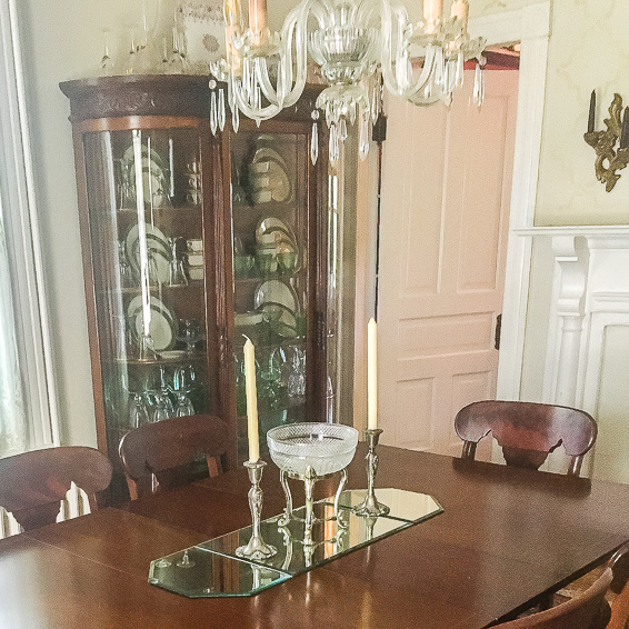 Dining room decorated with antiques on a 1912 home
