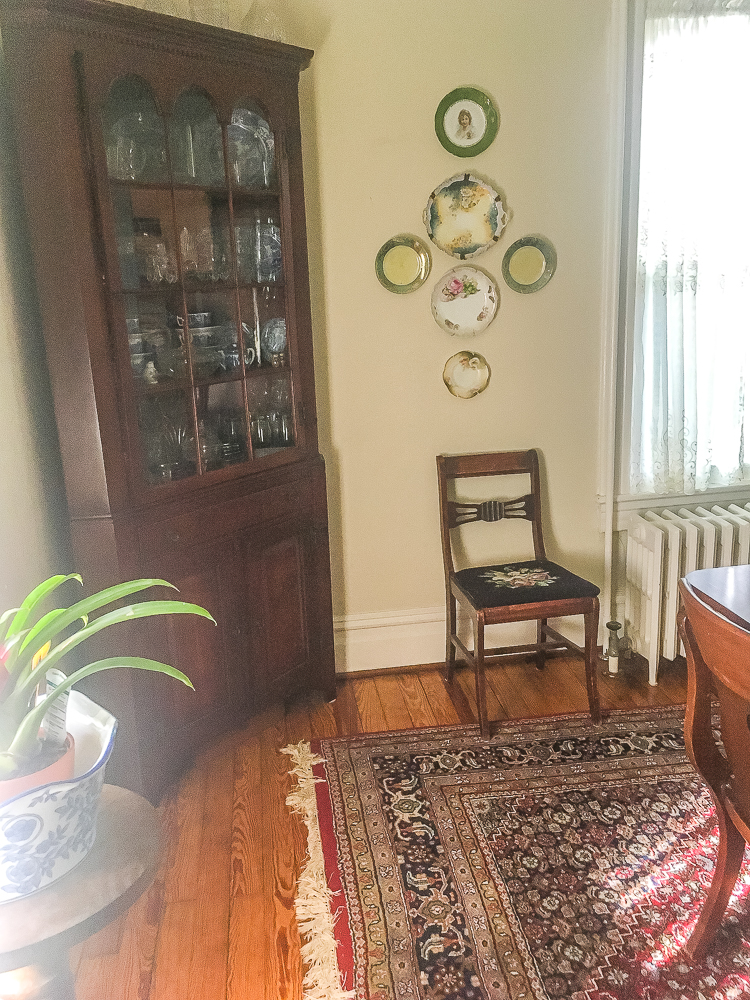 Antique Corner Hutch in a 1912 dining room decorated with inherited antiques.