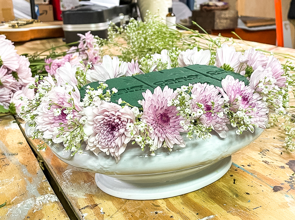 Making a purple Chrysanthemum and Baby's Breath floral arrangement