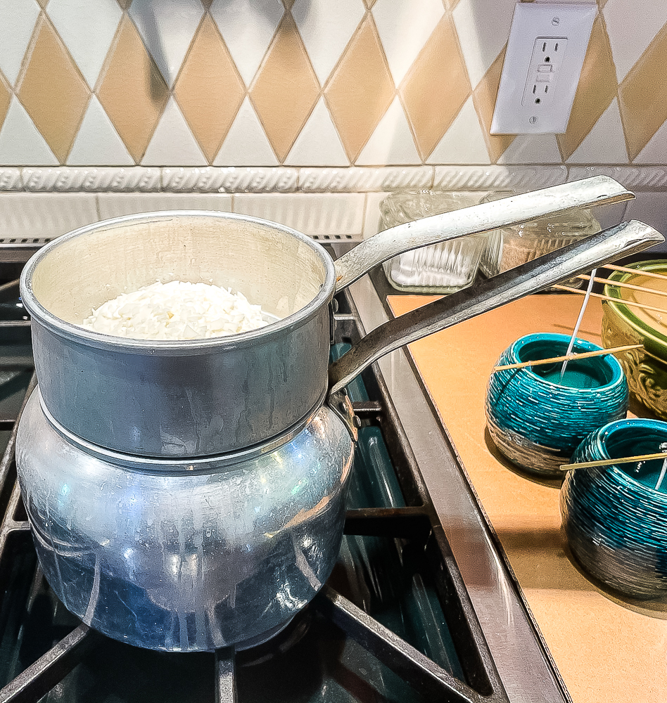 Melting soy candle wax in a double boiler