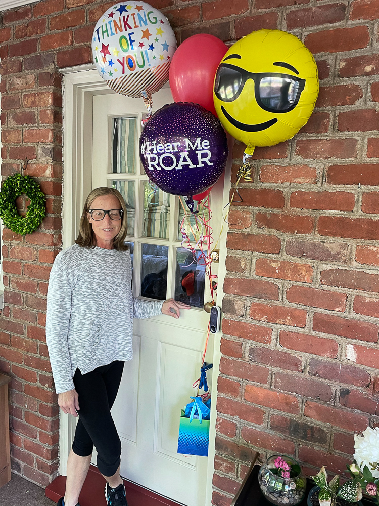 Balloons tied to a dutch door