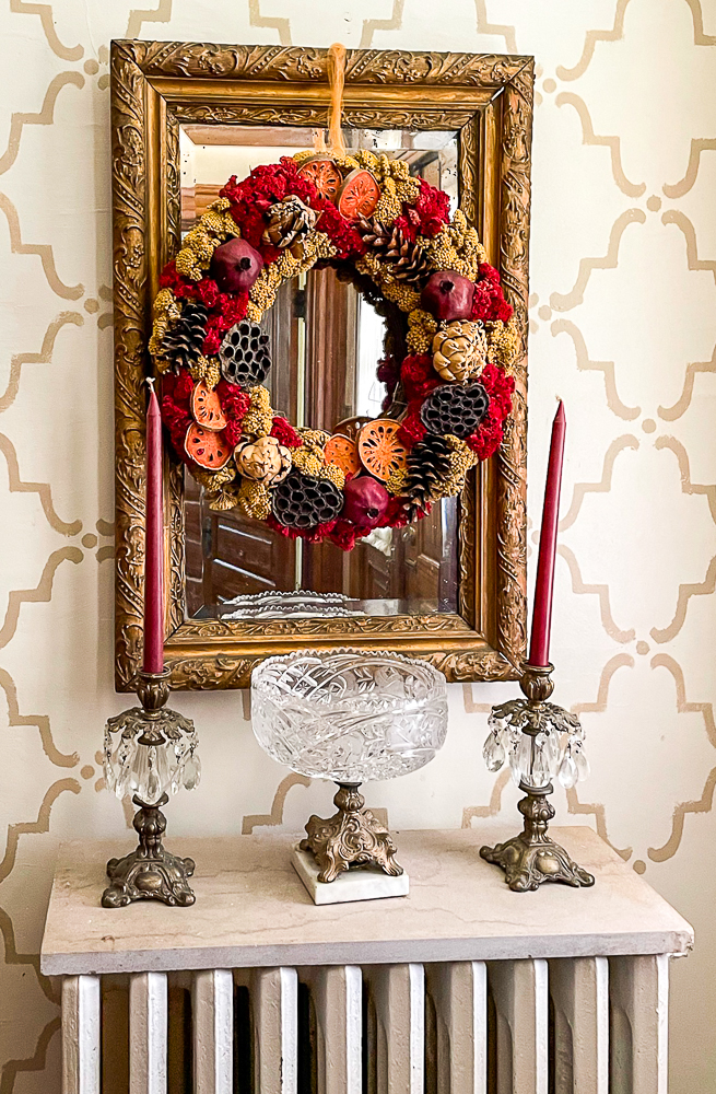 Antique Gold Mirror with a Williamsburg Style Wreath_