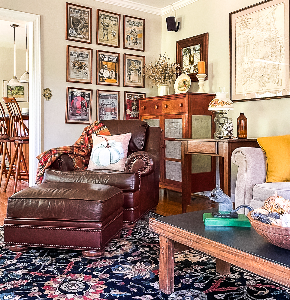 Family room decorated for fall in traditional colors