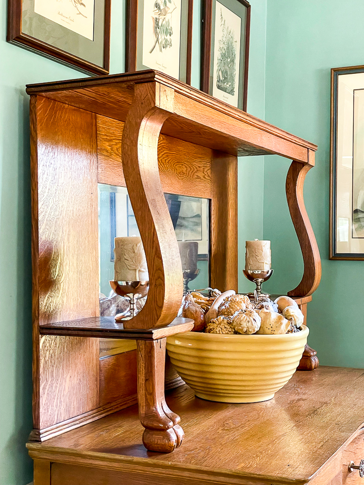 Antique oak buffet decorated for fall