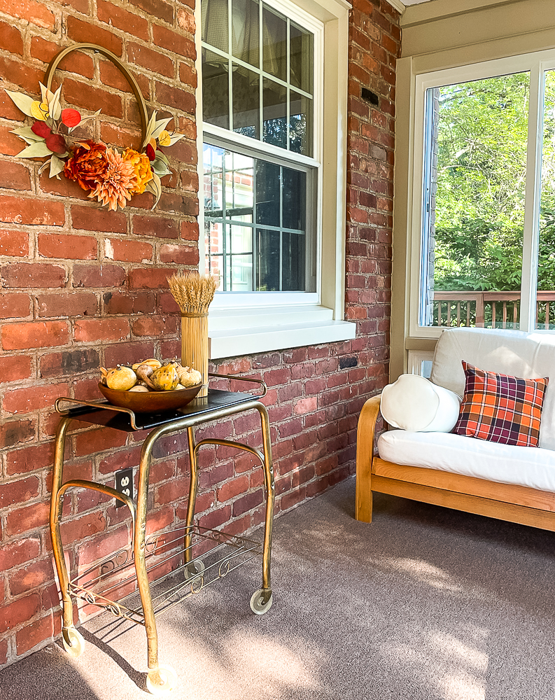 Sunroom decorated for Fall