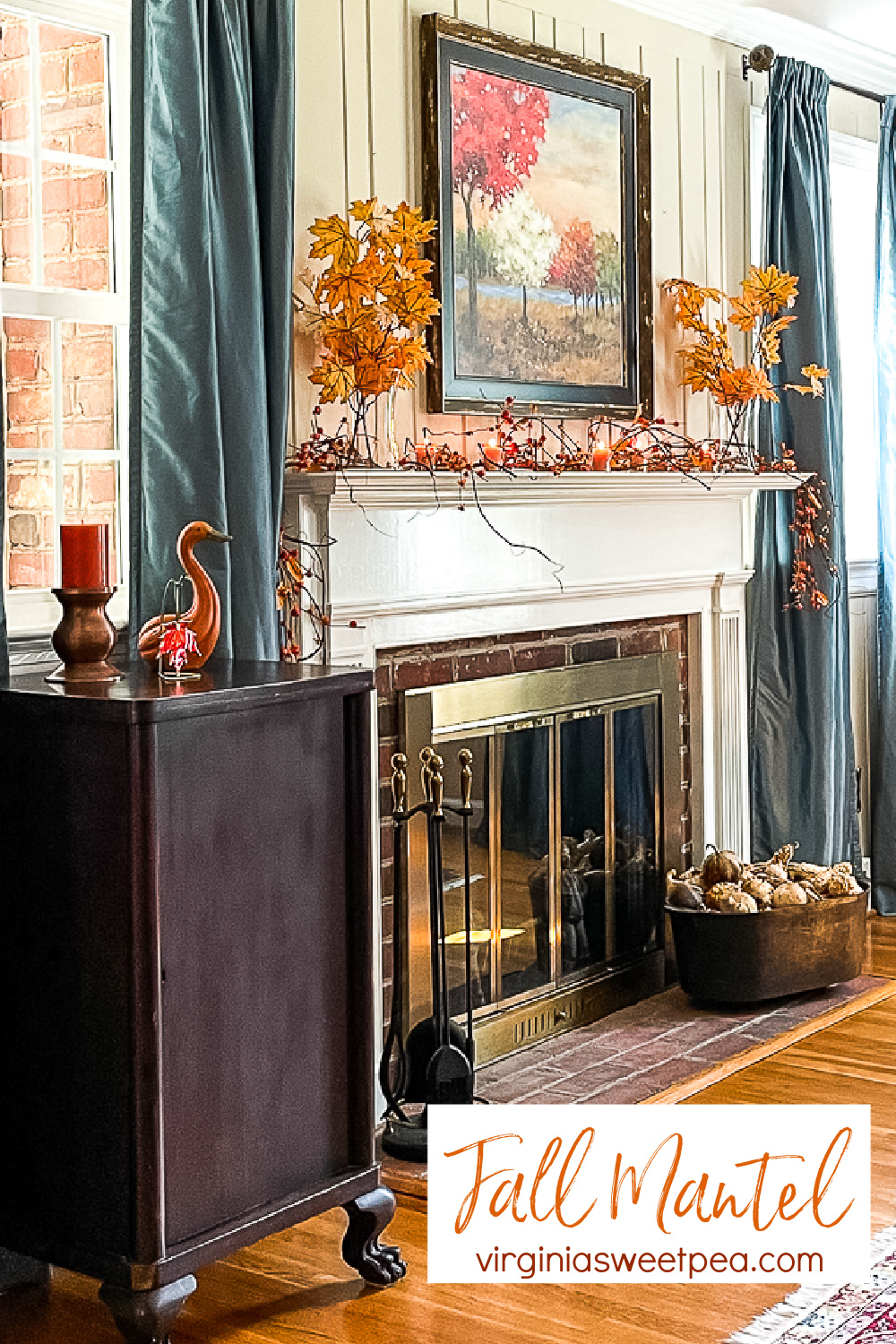 Fall mantel decorated in traditional fall colors