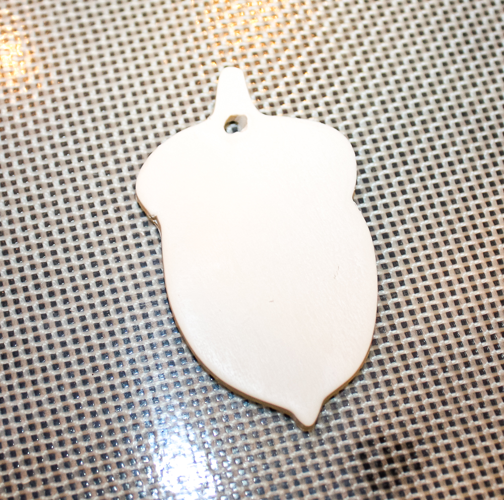 Acorn shaped clay ornament