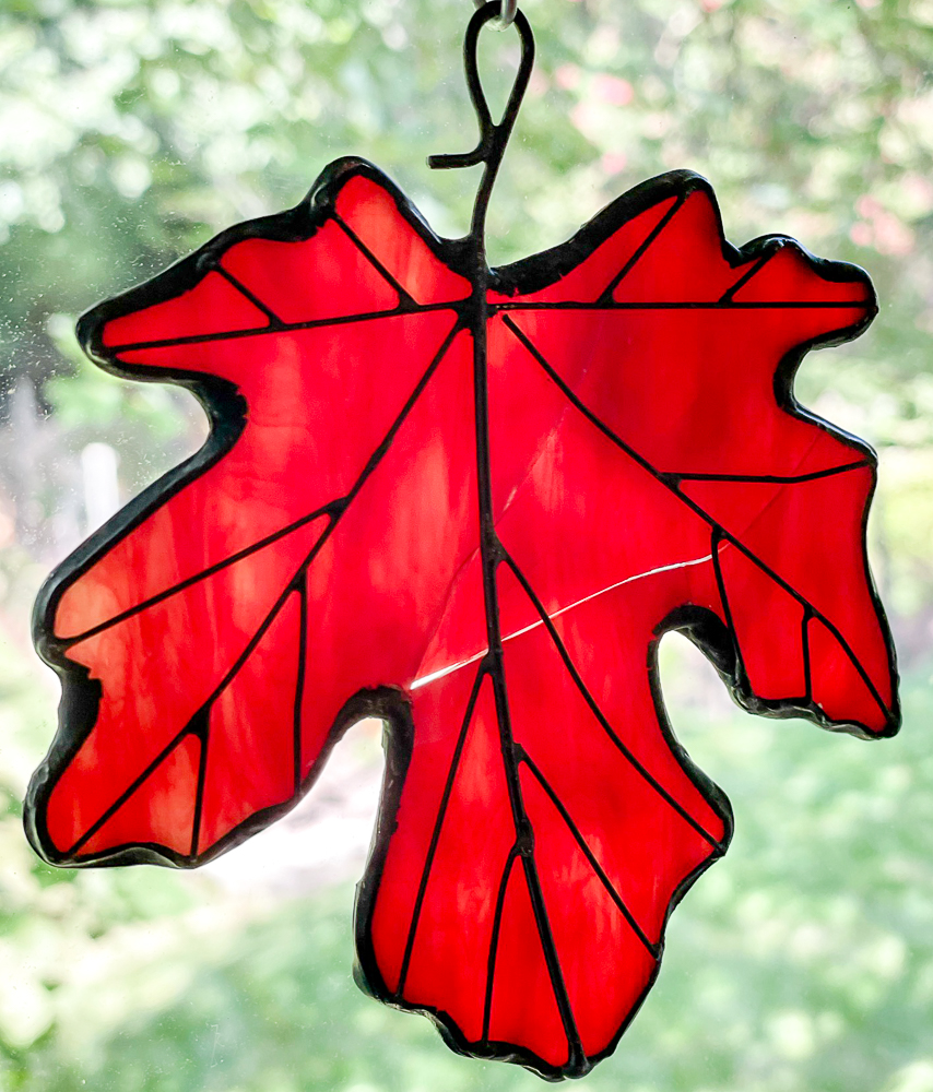 Stained glass red maple leaf suncatcher