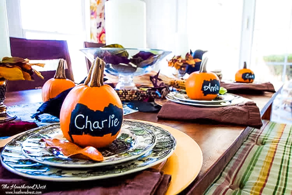 Pumpkins with chalkboard paint used as place cards