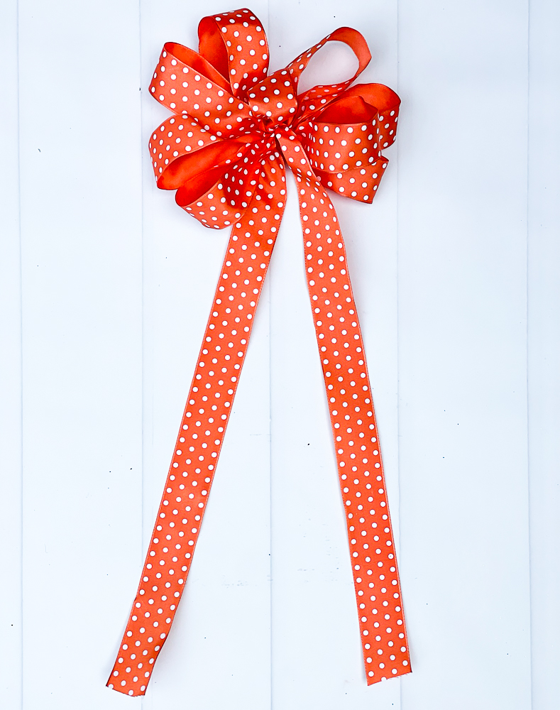 Orange polka dot bow