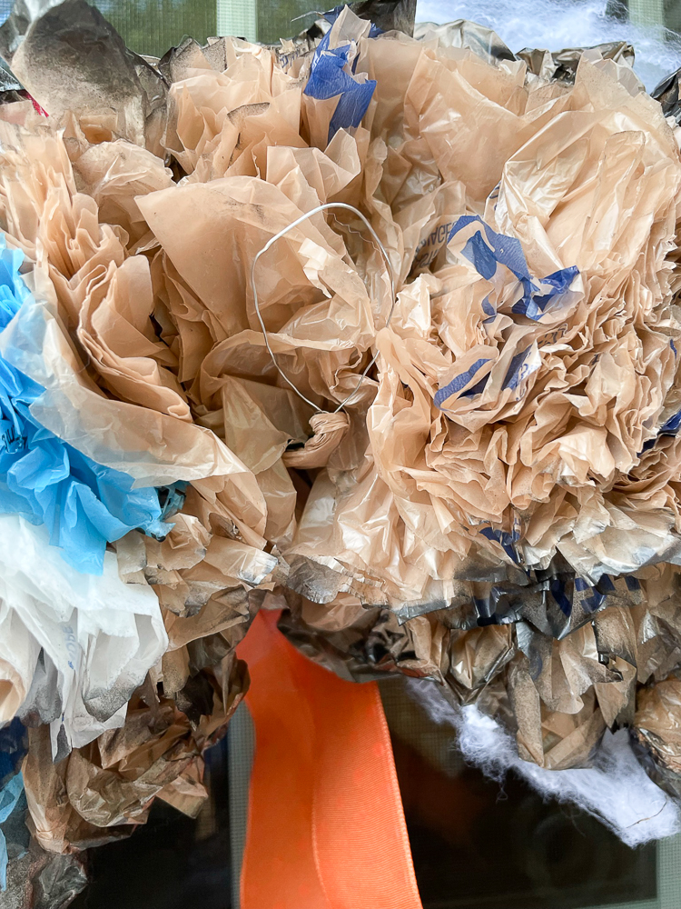 Step-by-step tutorial to make an upcycled plastic bag Halloween wreath