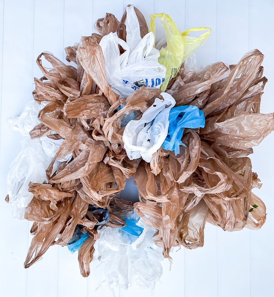 Step-by-step tutorial to make an upcycled plastic bag Halloween wreath