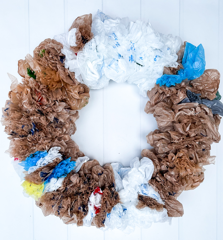 Step-by-step tutorial to make an upcycled plastic bag Halloween wreath