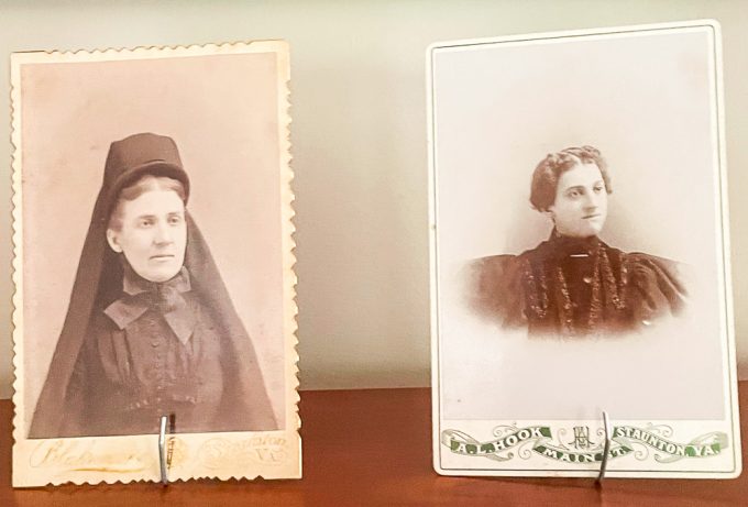 2 antique photographs of women in black outfits