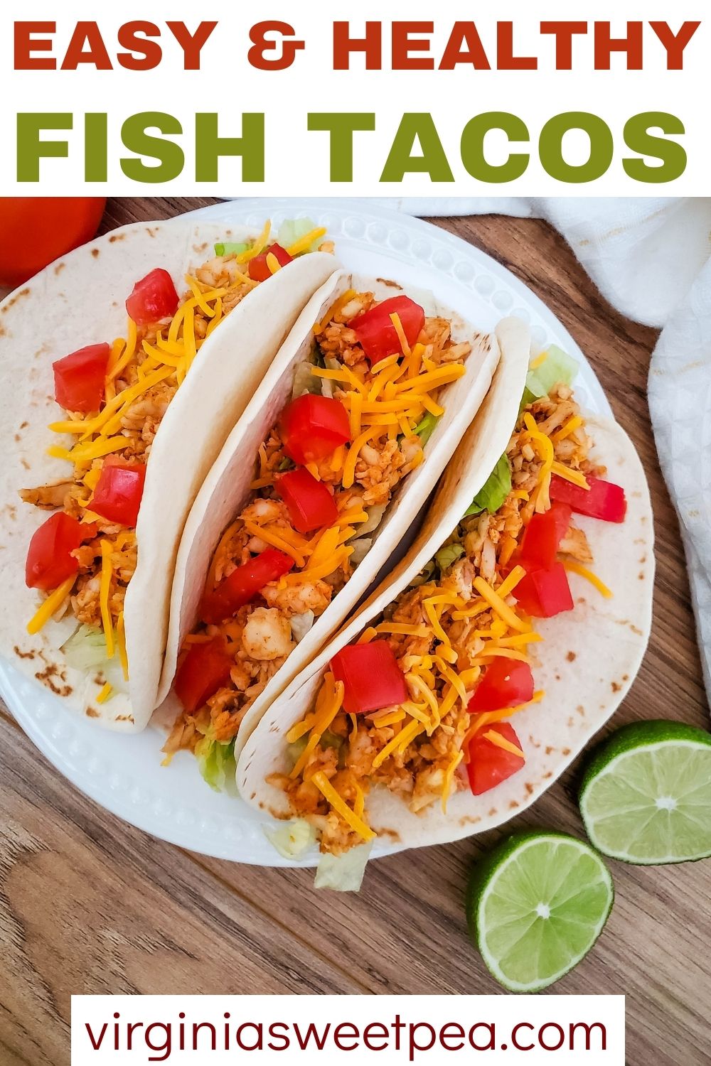 Three fish tacos on a white plate